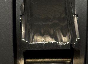 Verschlissene Wurfschaufel: Schaufelboden ausgewaschen, Abwurfkante ausgebrochen